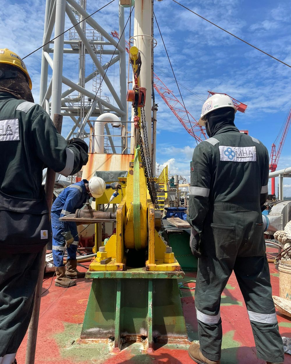 MHA AUTOMATION engineers at work on an offshore vessel deck
